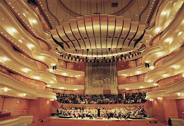 Concert Hall, Costa Mesa, CA- At over 8,000 square feet, the ribbons of the Acoustical Canopies were gilded in aluminum leaf.